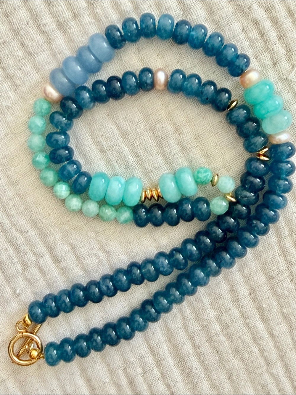 Teal and Aqua Opal Crystal Beaded Necklace with Gold Accents and Pearls.